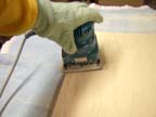 Sanding the shelves